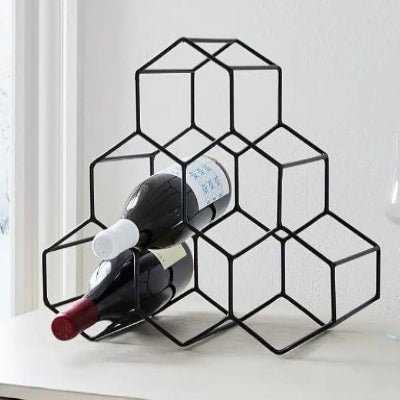 rangement bouteille de vin sur comptoir blanc