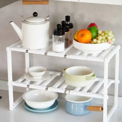 etagere pour cuisine blanc avec bols et théière