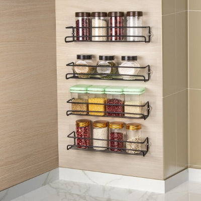 quatre etagere a epices sur angle de mur