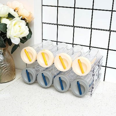 deux rangées de quatre bouteille dans rangement bouteille