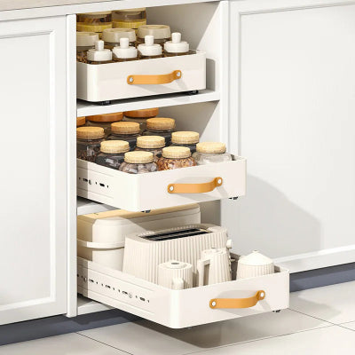 trois tiroir coulissant dans armoire cuisine